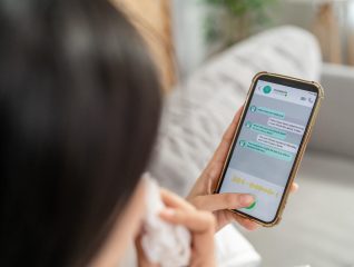 close-up-of-woman-patient-using-phone-apps-consult-2025-03-26-21-21-18-utc close-up-of-woman-patient-using-phone-apps-consult-2025-03-26-21-21-18-utc